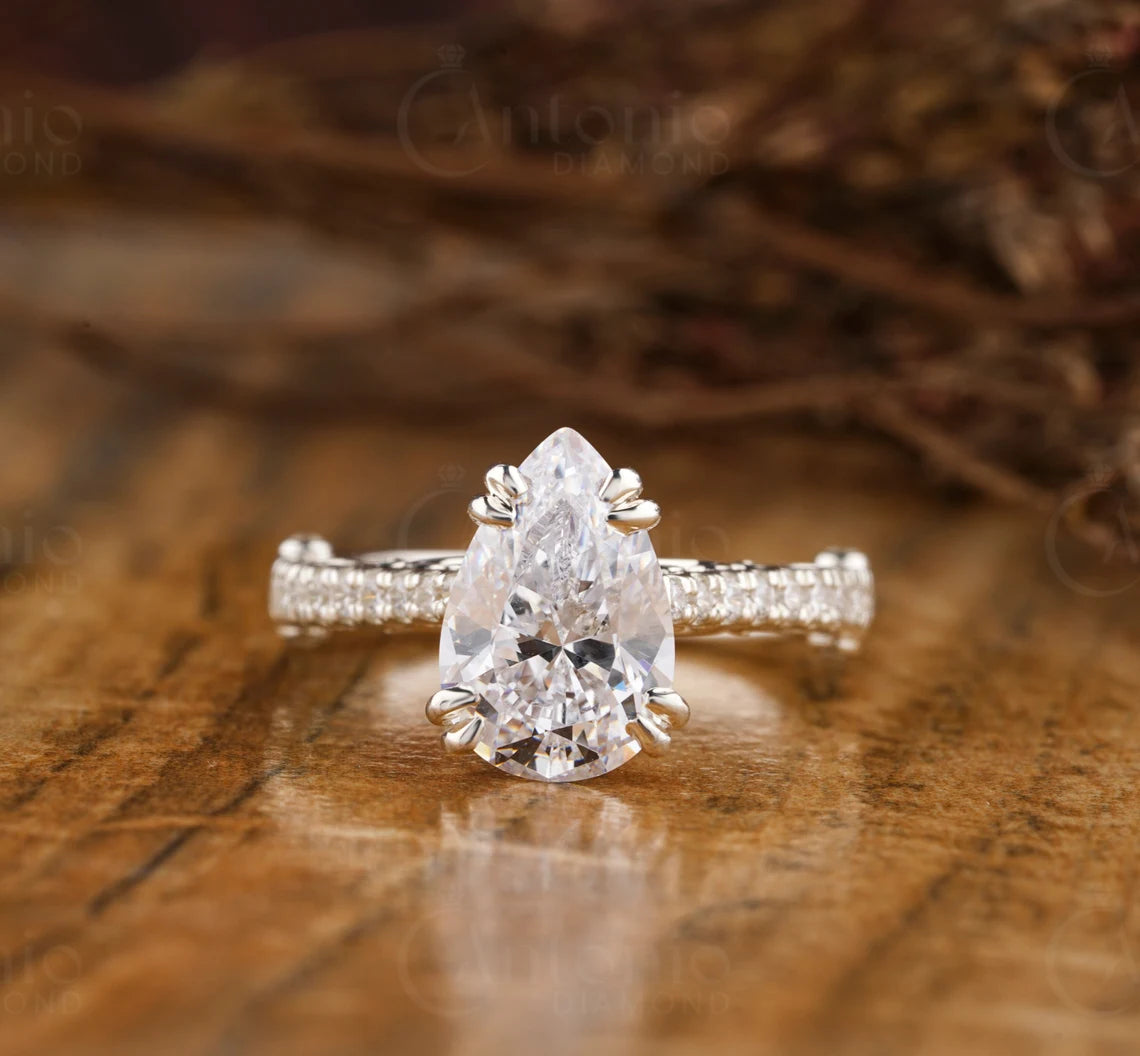 1.50 CT Pear Shaped Lab Grown F/VS1 Diamond Ring